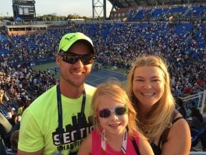 Oliver wearing his Nadal hat with family at the US Open