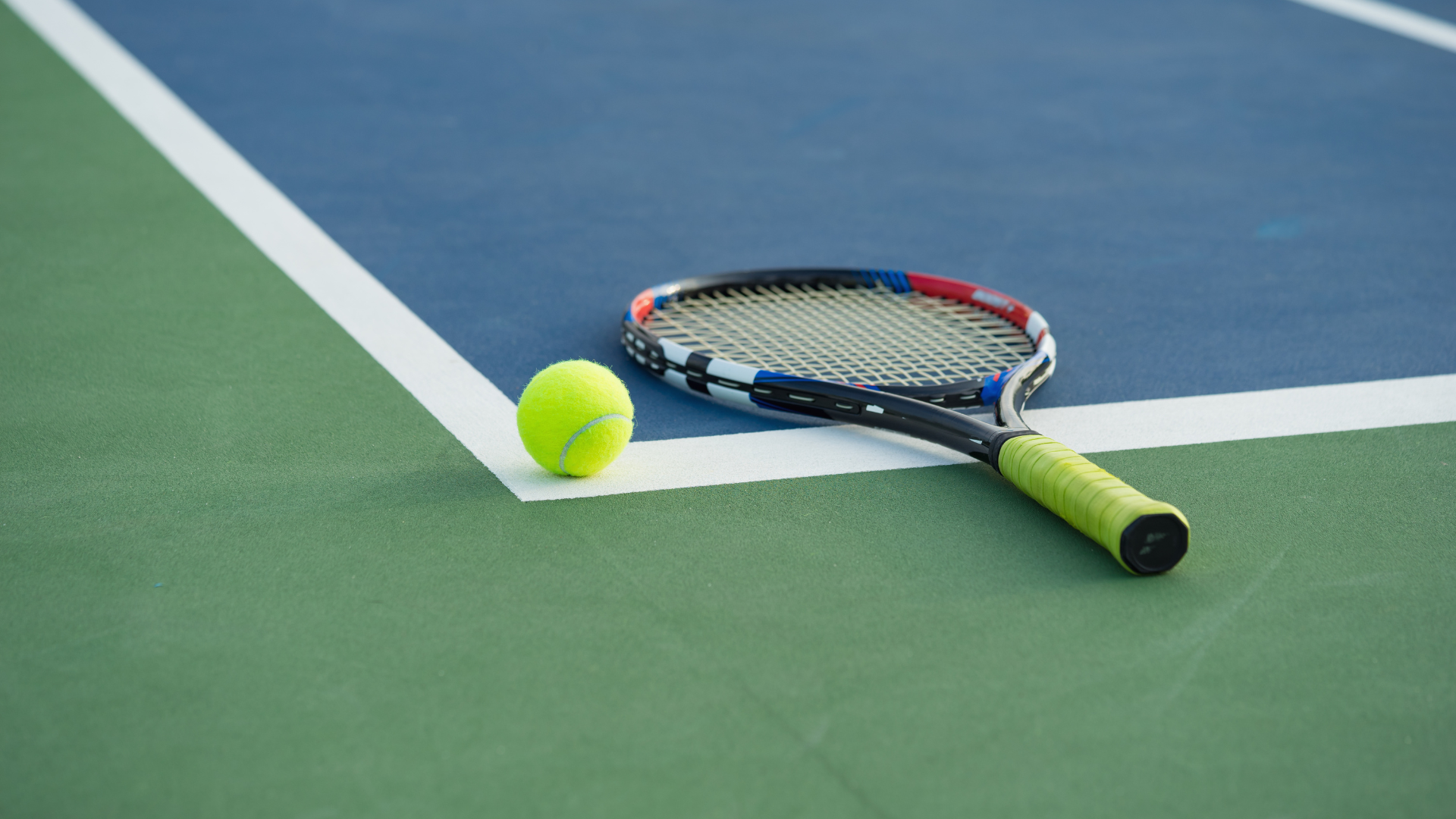 Tennis Racket on Court